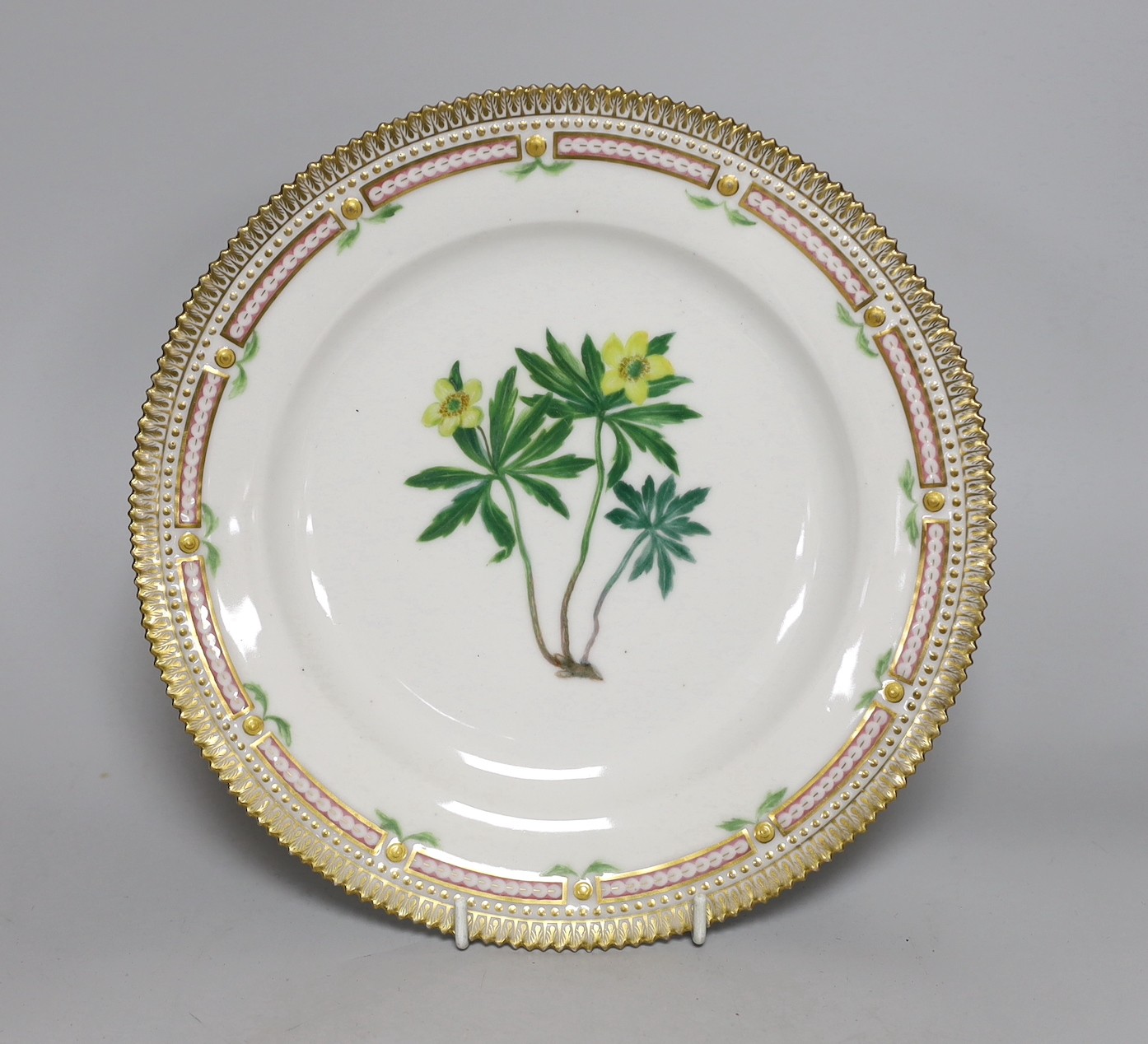 A Royal Copenhagen Flora Danica plate painted with Anemone, titled. 25cm